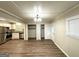 Open living area with hardwood flooring, access to the kitchen and ample closet space at 2159 Holly Hill Dr, Decatur, GA 30032