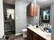 Functional bathroom with a combined shower and tub, vanity, and a window at 224 Potts Se Rd, Conyers, GA 30094