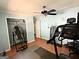 Bedroom with exercise equipment, wood flooring, and closet at 224 Potts Se Rd, Conyers, GA 30094