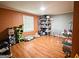 Spacious living room with wood floors and natural light from the window at 224 Potts Se Rd, Conyers, GA 30094