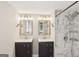 Modern bathroom featuring double sink vanity, stylish mirrors and marble-tiled shower at 3308 Quail Sw Run, Marietta, GA 30008