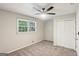 Bedroom with neutral walls, carpet, closet and natural light from the window at 3308 Quail Sw Run, Marietta, GA 30008