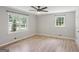 Spacious bedroom with large windows providing natural light and neutral paint at 3308 Quail Sw Run, Marietta, GA 30008