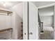 Walk-in closet with custom shelving and view to a staircase at 3308 Quail Sw Run, Marietta, GA 30008