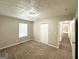 Bedroom with carpet floors, closet, and natural light at 5405 Lakeside Dr, Union City, GA 30291