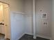 Functional laundry area with connections and a wire shelf, positioned conveniently next to a sink and vanity at 1672 Fuma Leaf Way Rd, Mcdonough, GA 30253