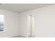 Bedroom featuring an open door to the bathroom at 307 Limestone Circle, Conyers, GA 30013