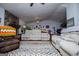 Spacious living room with a stone fireplace and an open layout at 7358 S Mitchell Ct, Villa Rica, GA 30180