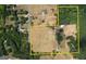 Large lot features open fields, wooded areas, outbuildings and a home site, outlined in yellow at 1024 Bethany Rd, Covington, GA 30016