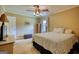 Bedroom featuring a ceiling fan, natural light, and neutral color scheme at 1024 Bethany Rd, Covington, GA 30016