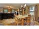 A spacious dining room flows into the living room, with an abundance of seating options at 1024 Bethany Rd, Covington, GA 30016