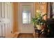 Inviting entryway with decorative glass door, tile flooring, and warm neutral paint at 1024 Bethany Rd, Covington, GA 30016