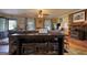 Living room with a cozy breakfast bar, brick fireplace, and an abundance of natural light at 1024 Bethany Rd, Covington, GA 30016