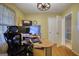 Office space featuring hardwood floors and natural light at 1024 Bethany Rd, Covington, GA 30016