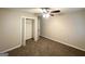 Bedroom with closet, neutral paint, and carpet flooring at 51 Springside Se Dr, Atlanta, GA 30354