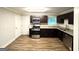 Updated kitchen features stainless steel appliances, granite countertops, and dark wood cabinetry at 51 Springside Se Dr, Atlanta, GA 30354