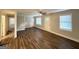 Large, bright living room with new flooring and fresh paint at 51 Springside Se Dr, Atlanta, GA 30354