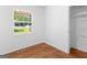 This bedroom offers a view and built in closet shelving at 1356 Lori Ct, Conley, GA 30288
