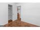 Bright bedroom with ample storage and a view to the kitchen area at 1356 Lori Ct, Conley, GA 30288