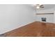 Bright living room with brick fireplace and wood-look floors at 1356 Lori Ct, Conley, GA 30288