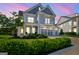 Stunning two-story home featuring a three-car garage and a charming second-story balcony at 229 Widener Way, Peachtree City, GA 30269