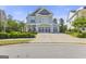 Beautiful two-story home with a three-car garage, balcony, and a spacious driveway at 229 Widener Way, Peachtree City, GA 30269