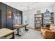 A home office featuring a wooden desk, comfortable chair, and modern lighting fixtures at 229 Widener Way, Peachtree City, GA 30269