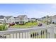Street view showcases well-maintained homes, green lawns, and a neatly paved road at 229 Widener Way, Peachtree City, GA 30269