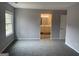Bright bedroom featuring carpet floors, a window and easy access to a full bath at 2914 Parc Lorraine, Lithonia, GA 30038