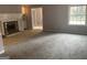 Open living room with fireplace and fresh paint providing comfortable space at 2914 Parc Lorraine, Lithonia, GA 30038