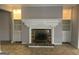 Cozy living room with fireplace, built-in shelving, and tiled flooring at 2914 Parc Lorraine, Lithonia, GA 30038