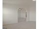 Spacious room features an archway, neutral carpet and bright natural light at 524 Harmony Way, Locust Grove, GA 30248