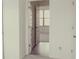 Hallway view into bedroom with natural light at 524 Harmony Way, Locust Grove, GA 30248