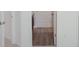 Hallway view into bath and bedroom with natural light at 524 Harmony Way, Locust Grove, GA 30248