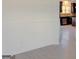 Open-concept kitchen featuring dark cabinets, stainless steel appliances, and light-colored flooring, creating a modern space at 524 Harmony Way, Locust Grove, GA 30248