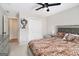 Cozy bedroom with a leopard-print bed, neutral walls, and a double-door closet at 1478 Interlaken Pass, Jonesboro, GA 30238