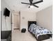 Cool, space themed room with lots of space and a ceiling fan at 1478 Interlaken Pass, Jonesboro, GA 30238