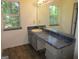 Simple bathroom with vanity and mirror at 4382 Highway 42 S, Locust Grove, GA 30248