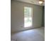 Bright bedroom with a large window offering natural light at 4382 Highway 42 S, Locust Grove, GA 30248