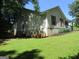Exterior view of a single-story home on a sunny day at 4382 Highway 42 S, Locust Grove, GA 30248