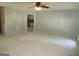 Empty living room leading to kitchen at 4382 Highway 42 S, Locust Grove, GA 30248