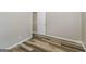An accessible view of the interior with wood laminate flooring at 2577 Shropshire Pl, Mcdonough, GA 30253