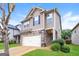 Charming two-story home featuring a stone facade and a two-car garage at 2577 Shropshire Pl, Mcdonough, GA 30253