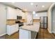 Modern kitchen featuring stainless steel appliances and granite countertops at 2577 Shropshire Pl, Mcdonough, GA 30253