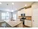 Modern kitchen featuring stainless steel appliances and granite countertops at 2577 Shropshire Pl, Mcdonough, GA 30253
