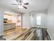 A combined living room and kitchen featuring an open floor plan at 2577 Shropshire Pl, Mcdonough, GA 30253
