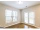 Bright room featuring hardwood floors and natural light at 2577 Shropshire Pl, Mcdonough, GA 30253