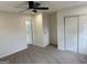 Bedroom features neutral walls, carpet, closet, and paneled interior doors at 3339 Clevemont Ct, Ellenwood, GA 30294