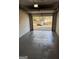 Spacious garage featuring a concrete floor and an automatic garage door opener at 3339 Clevemont Ct, Ellenwood, GA 30294