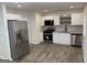 Modern kitchen featuring stainless steel appliances and ample counter space at 3339 Clevemont Ct, Ellenwood, GA 30294